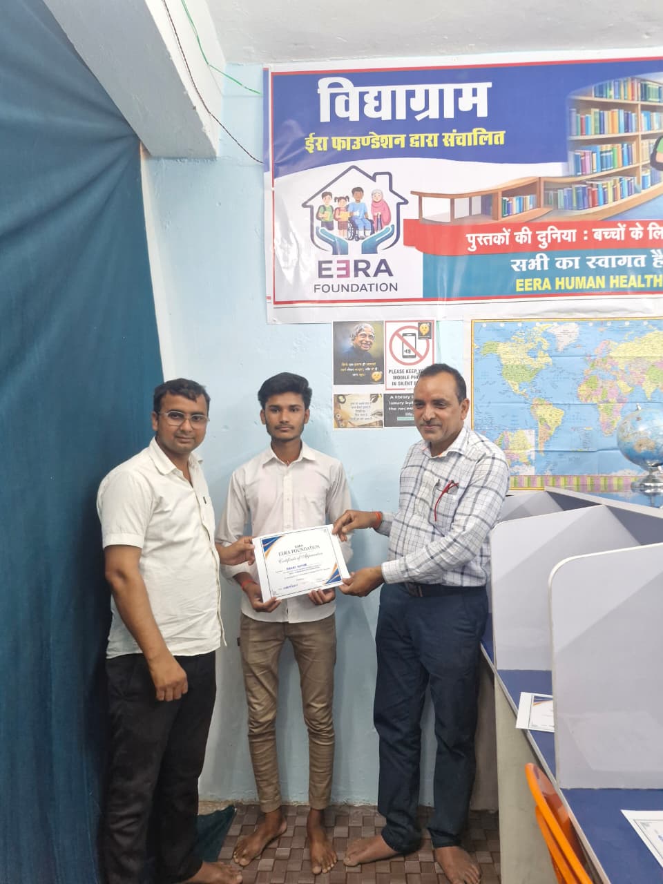 A student receiving recognition at EERA Foundation